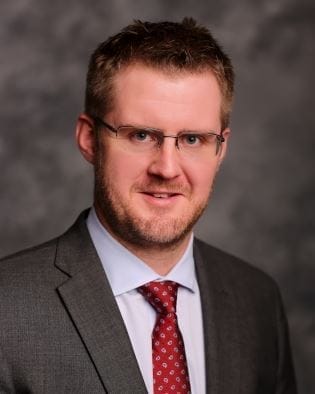 the sam c. mitchell & associates legal team welcomes new attorney tyler nelson dihle, sam c. mitchell and associates
